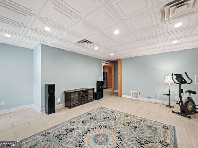 living room with bar, light tile patterned floors, and beverage cooler