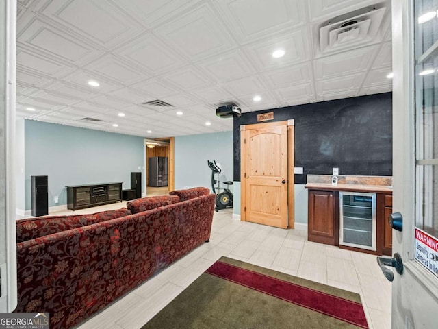 kitchen with beverage cooler and sink