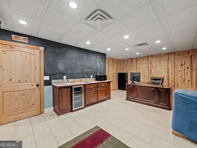 office space featuring wooden walls