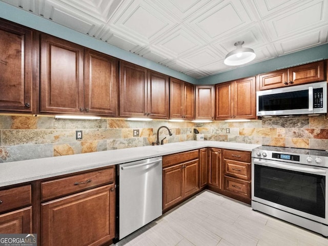 kitchen featuring sink and appliances with stainless steel finishes