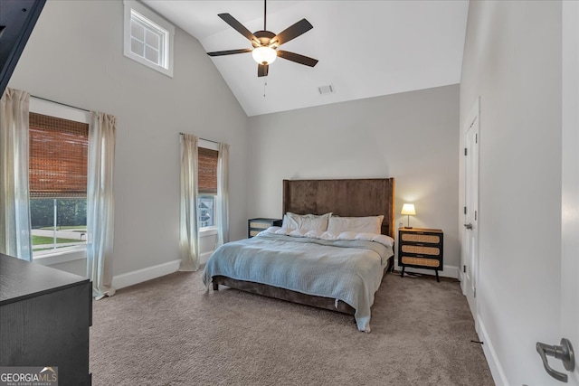 bedroom featuring ceiling fan, light carpet, and high vaulted ceiling