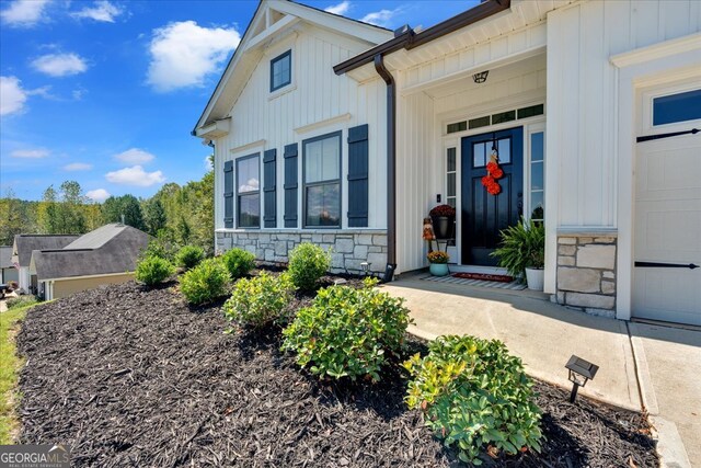 property entrance featuring a garage