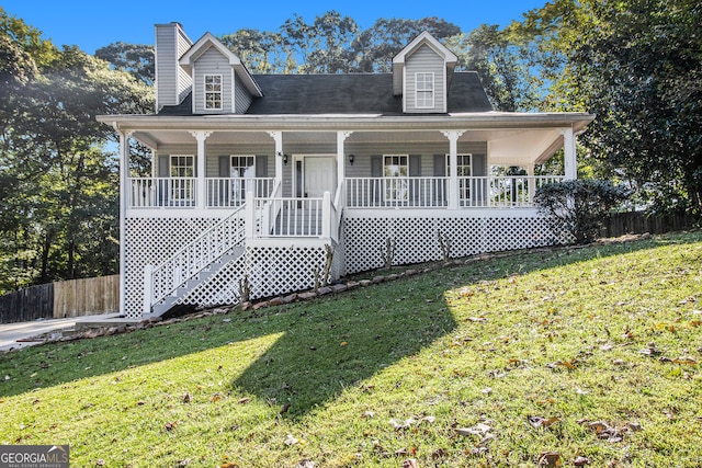 view of front facade featuring a porch and a front lawn