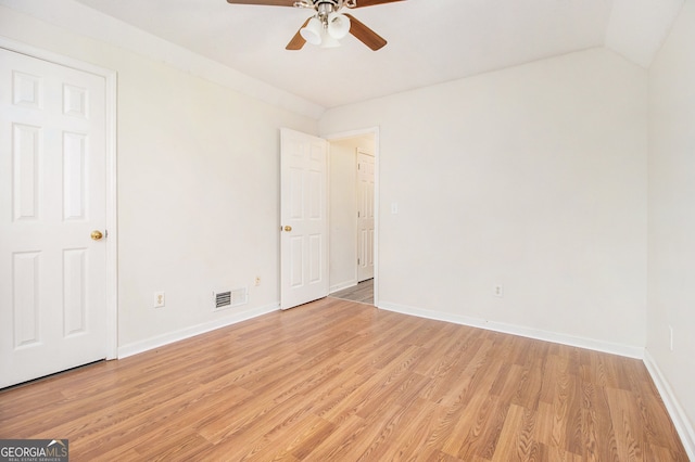 spare room featuring ceiling fan and light wood-type flooring