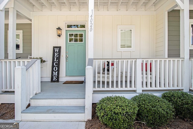 doorway to property with a porch