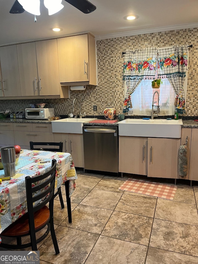 kitchen featuring ceiling fan, dishwasher, sink, backsplash, and crown molding