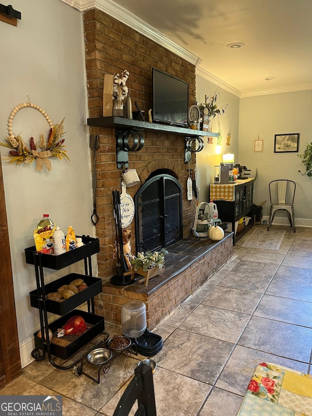 living room with tile patterned floors, a brick fireplace, and ornamental molding