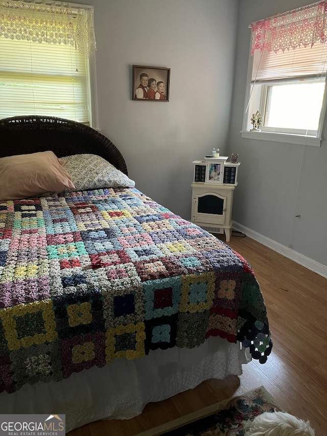 bedroom featuring hardwood / wood-style floors