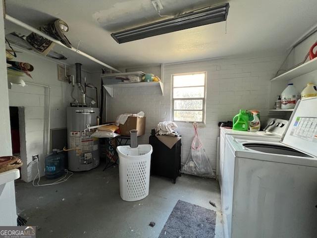 washroom featuring washer and dryer and gas water heater