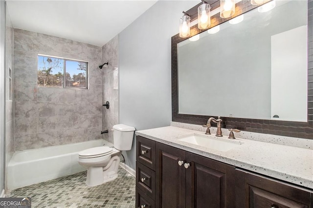 full bathroom with decorative backsplash, tiled shower / bath, vanity, toilet, and tile patterned floors