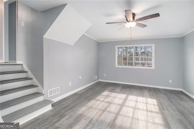 unfurnished living room with ceiling fan, hardwood / wood-style flooring, and crown molding