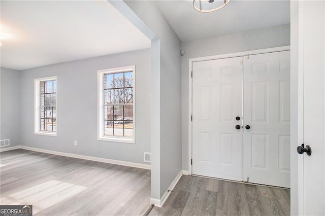 foyer with light hardwood / wood-style flooring