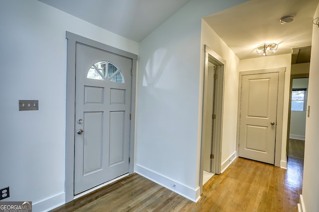 foyer entrance with light hardwood / wood-style flooring