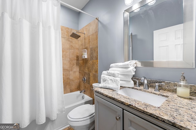 full bathroom featuring vanity, toilet, and shower / bathtub combination with curtain