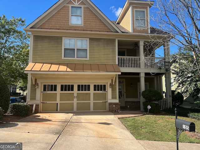 view of front of house featuring a garage and a porch