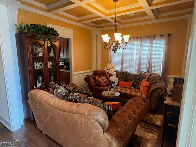 living room with coffered ceiling, an inviting chandelier, crown molding, and dark wood-type flooring