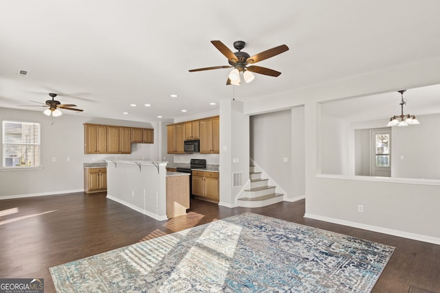 23 Brookview Dr, Newnan, GA 30265 - living area with recessed lighting, dark wood-type flooring, baseboards, and ceiling fan