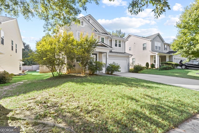 view of front facade with a garage and a front lawn