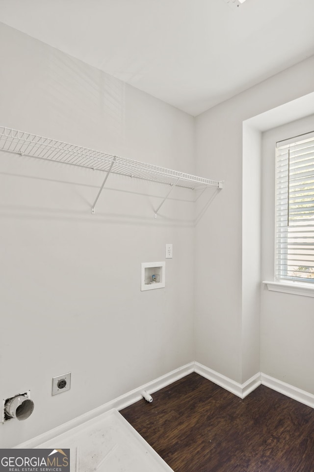 23 Brookview Dr, Newnan, GA 30265 - washroom with laundry area, hookup for a washing machine, baseboards, electric dryer hookup, and dark wood-type flooring