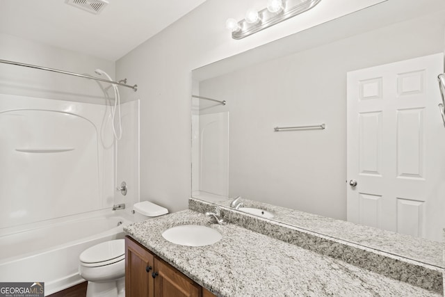 full bathroom featuring shower / tub combination, vanity, and toilet