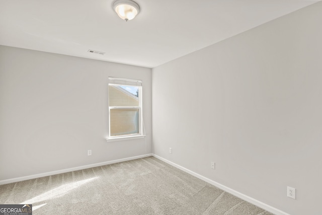 23 Brookview Dr, Newnan, GA 30265 - empty room featuring baseboards, carpet floors, and visible vents