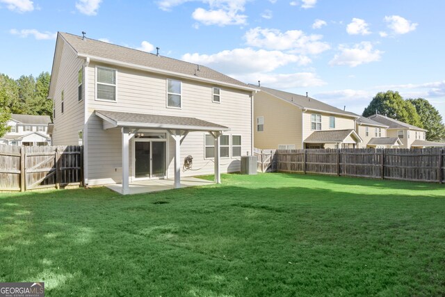 23 Brookview Dr, Newnan, GA 30265 - back of house with a yard, a patio, and a fenced backyard