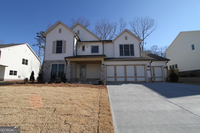 view of front of home with a garage