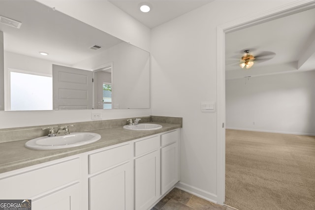 bathroom featuring ceiling fan and vanity