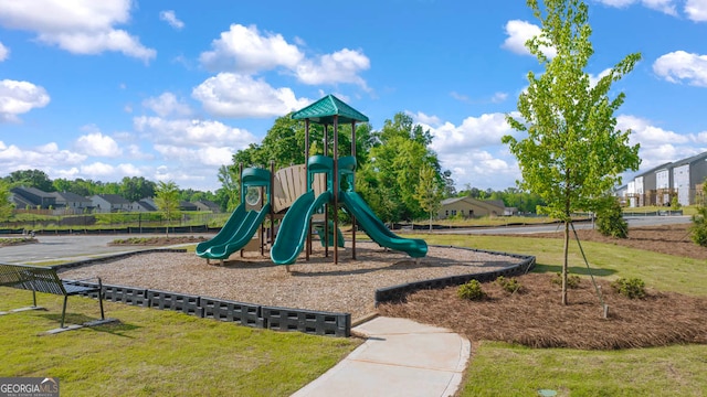 view of play area featuring a lawn