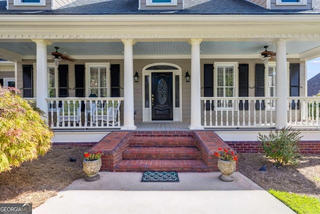 doorway to property with ceiling fan and covered porch