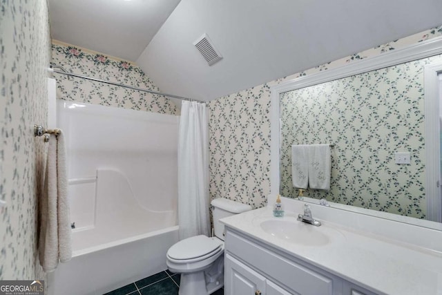 full bathroom featuring vaulted ceiling, vanity, shower / bath combo, tile patterned flooring, and toilet