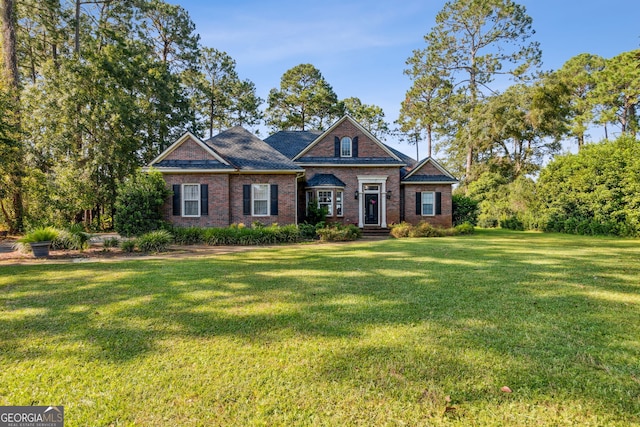 craftsman inspired home with a front lawn