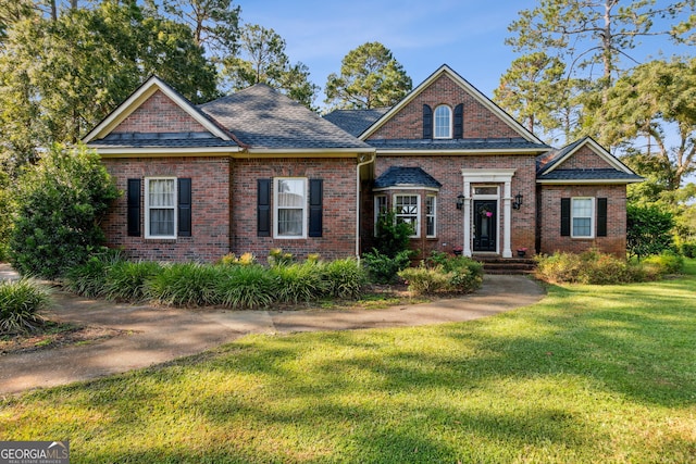 view of front of home with a front lawn