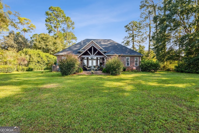 view of front of home with a front lawn