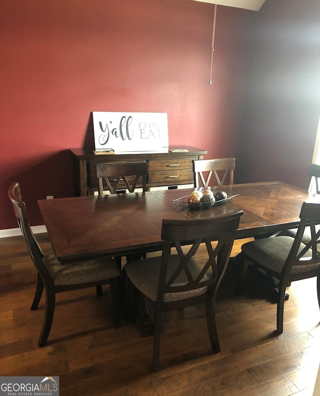 dining space featuring hardwood / wood-style floors