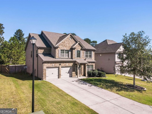 view of front of house featuring a front lawn and a garage