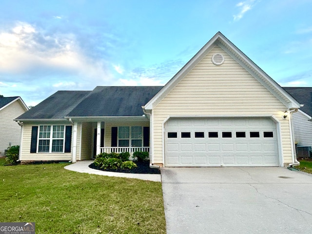 ranch-style home with a front yard, a porch, and a garage