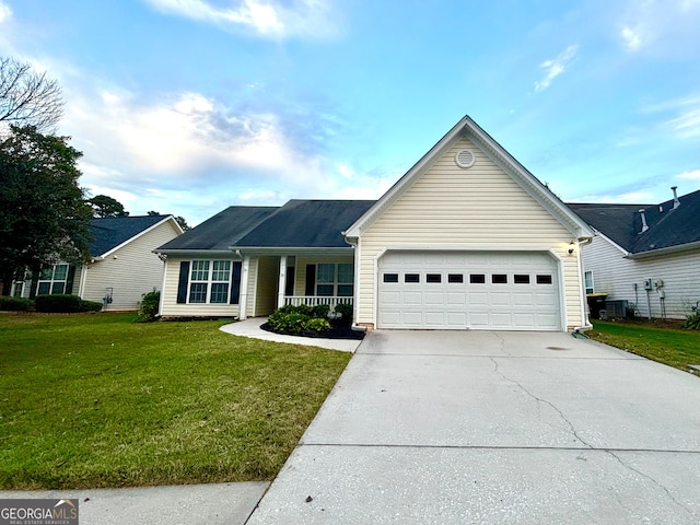 ranch-style home with a garage, covered porch, and a front lawn