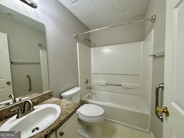 full bathroom featuring vanity, tile patterned flooring, a textured ceiling, bathing tub / shower combination, and toilet