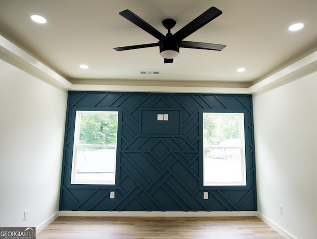 entrance foyer featuring ceiling fan and hardwood / wood-style flooring