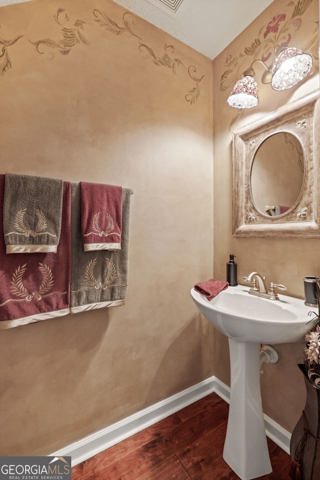 bathroom featuring hardwood / wood-style floors