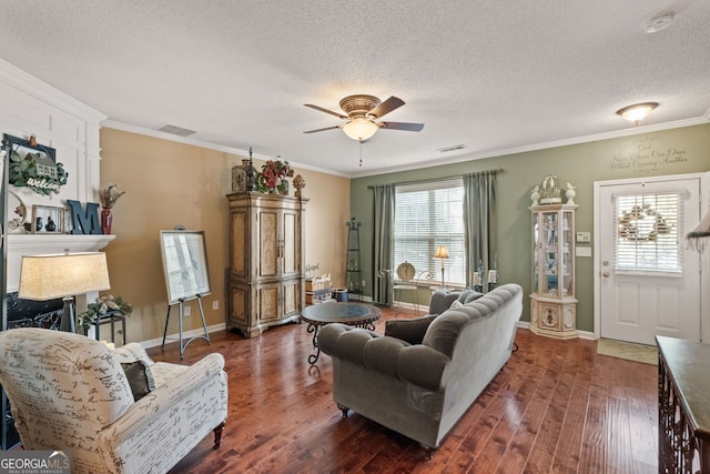 living room with ceiling fan, crown molding, dark hardwood / wood-style floors, and plenty of natural light