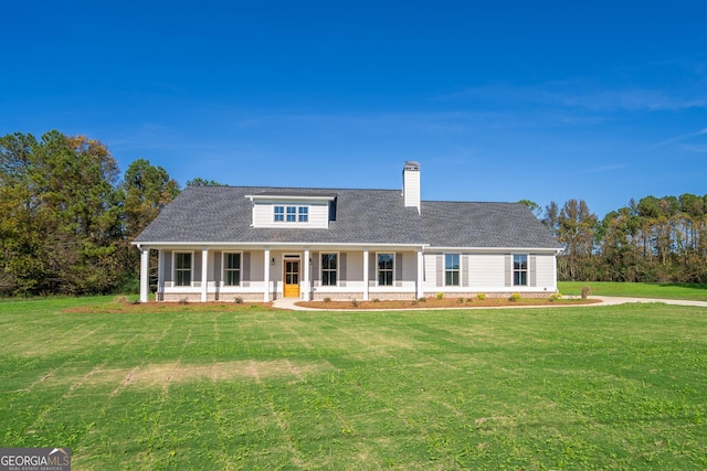 view of front facade featuring a front yard and a porch