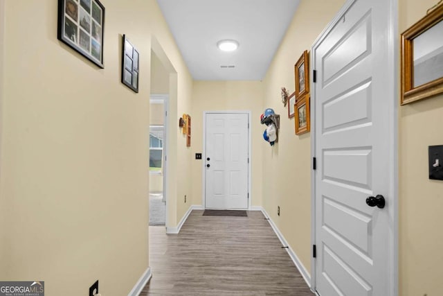 hall featuring hardwood / wood-style floors