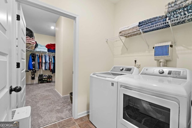 laundry area with carpet and washer and dryer