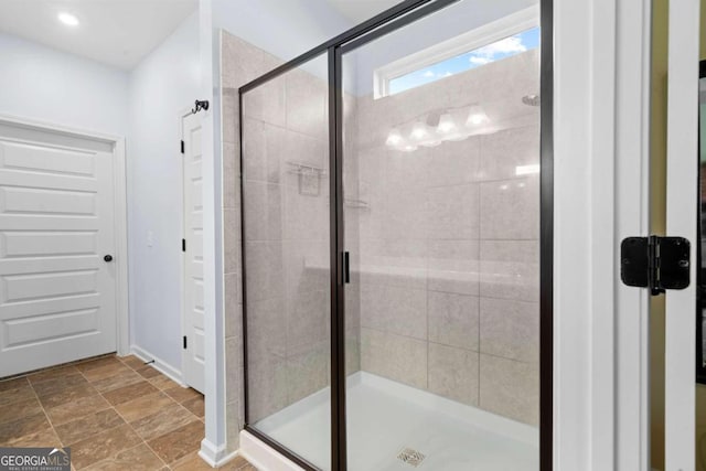 bathroom featuring an enclosed shower