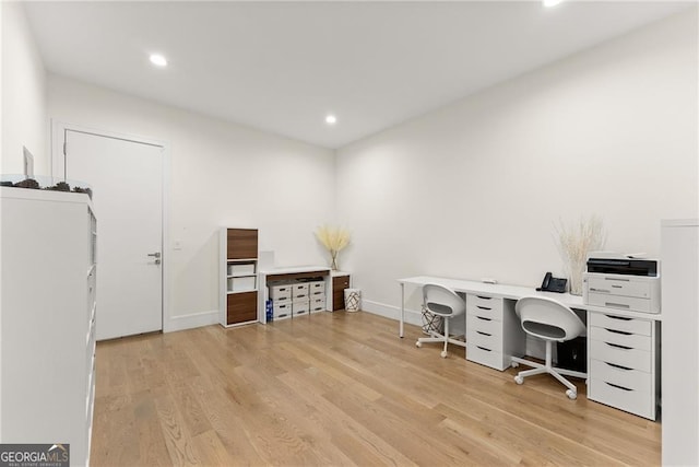 office space featuring light wood-type flooring