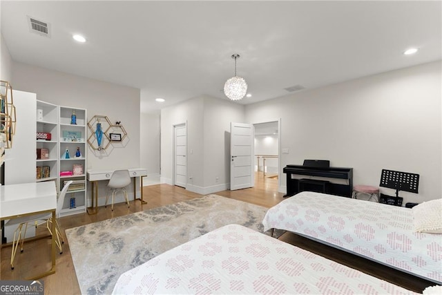 bedroom with light wood-type flooring