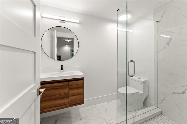 bathroom featuring vanity, toilet, and an enclosed shower