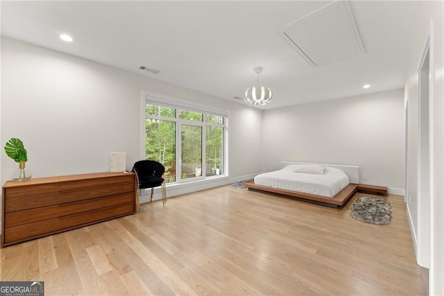 bedroom featuring light hardwood / wood-style floors